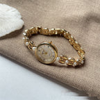 Damenarmbanduhr mit Metallarmband und Perlen
