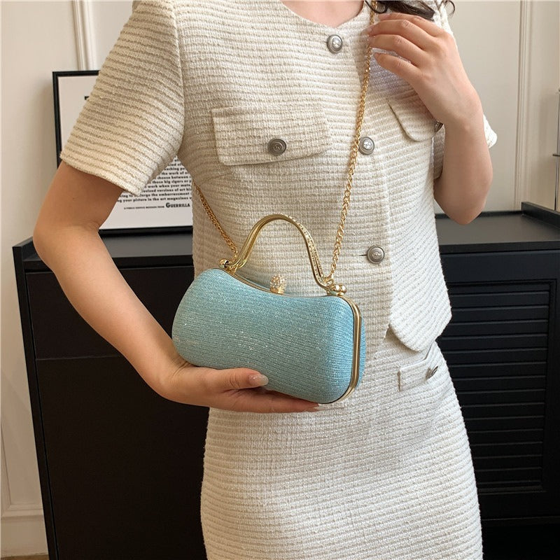 Abendtasche für Damen mit glänzenden Details und schmuckvollem Griff - Dhalia