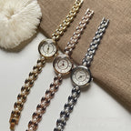 Damenarmbanduhr mit Metallarmband und Perlen