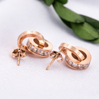 Roségoldfarbene Damen-Ohrringe mit Kristallen