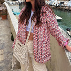 Steppjacke mit Blumenmuster, geometrischem Muster und Taschen