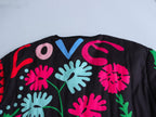 Jeansjacke mit Graffiti-Print und Taschen