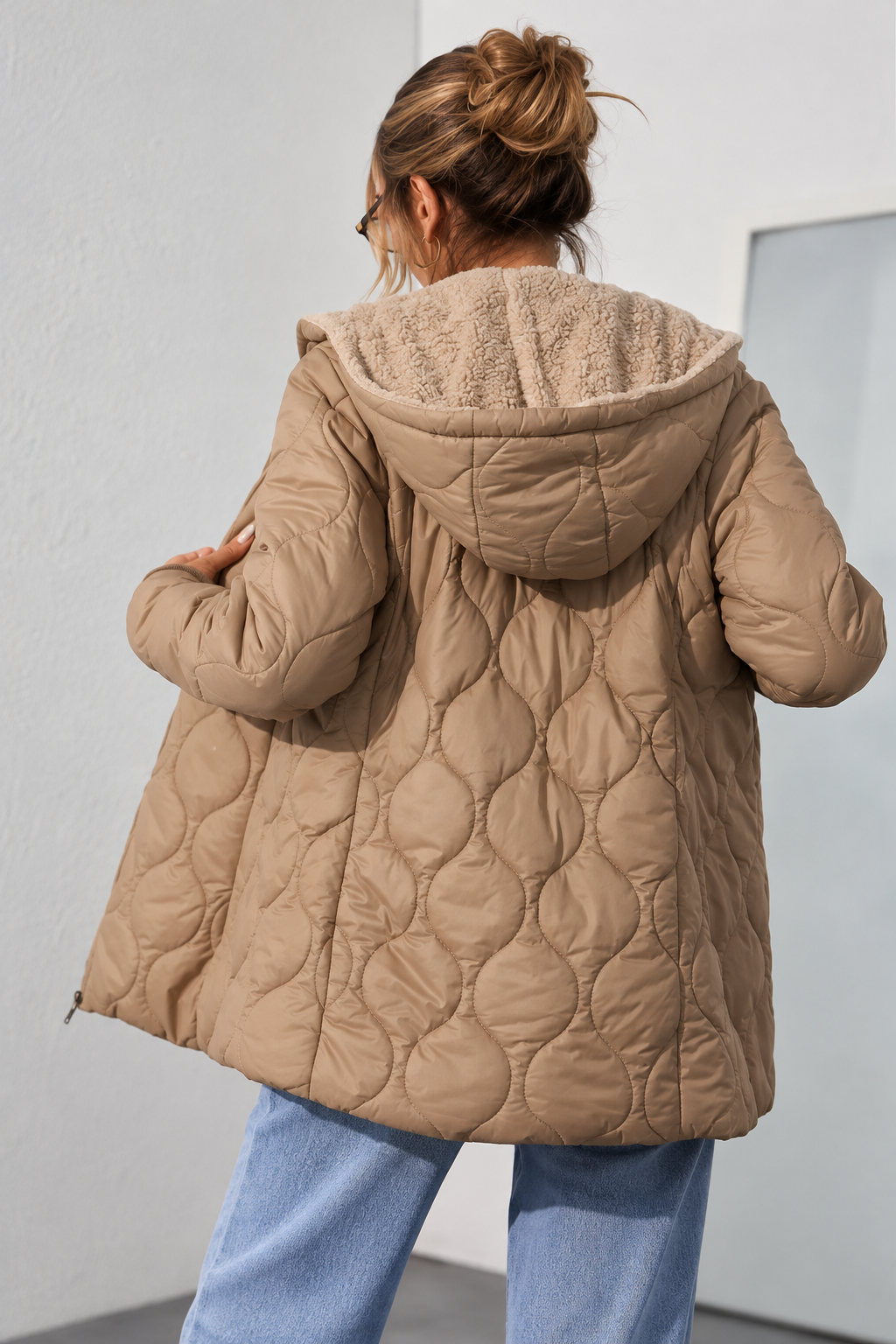 Lange Steppjacke mit Teddyfutter