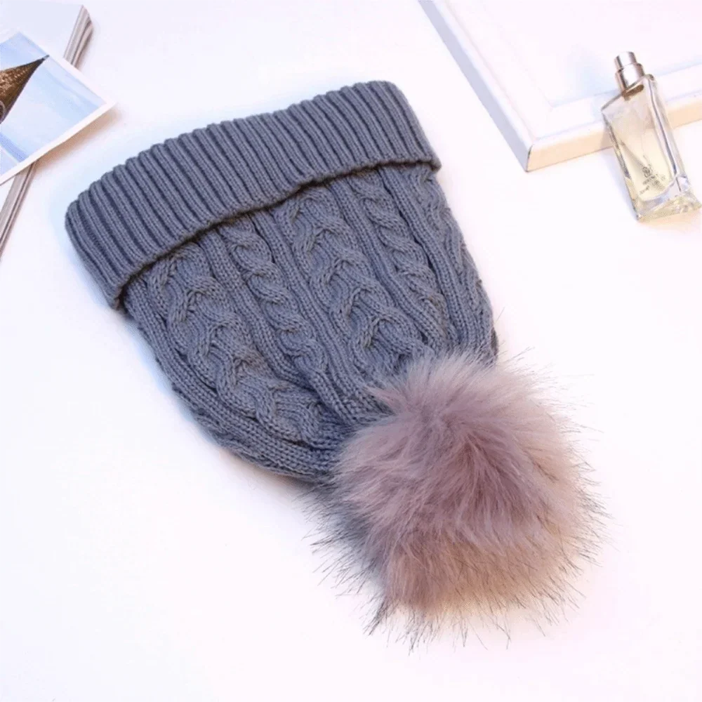Damenstrickmütze mit Fleecefutter und Bommel - Sauly