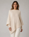 Asymmetrischer Strickpullover mit weiten Ärmeln