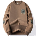 Herrenpullover mit Rundhalsausschnitt und dekorativen Patches - Bjornik