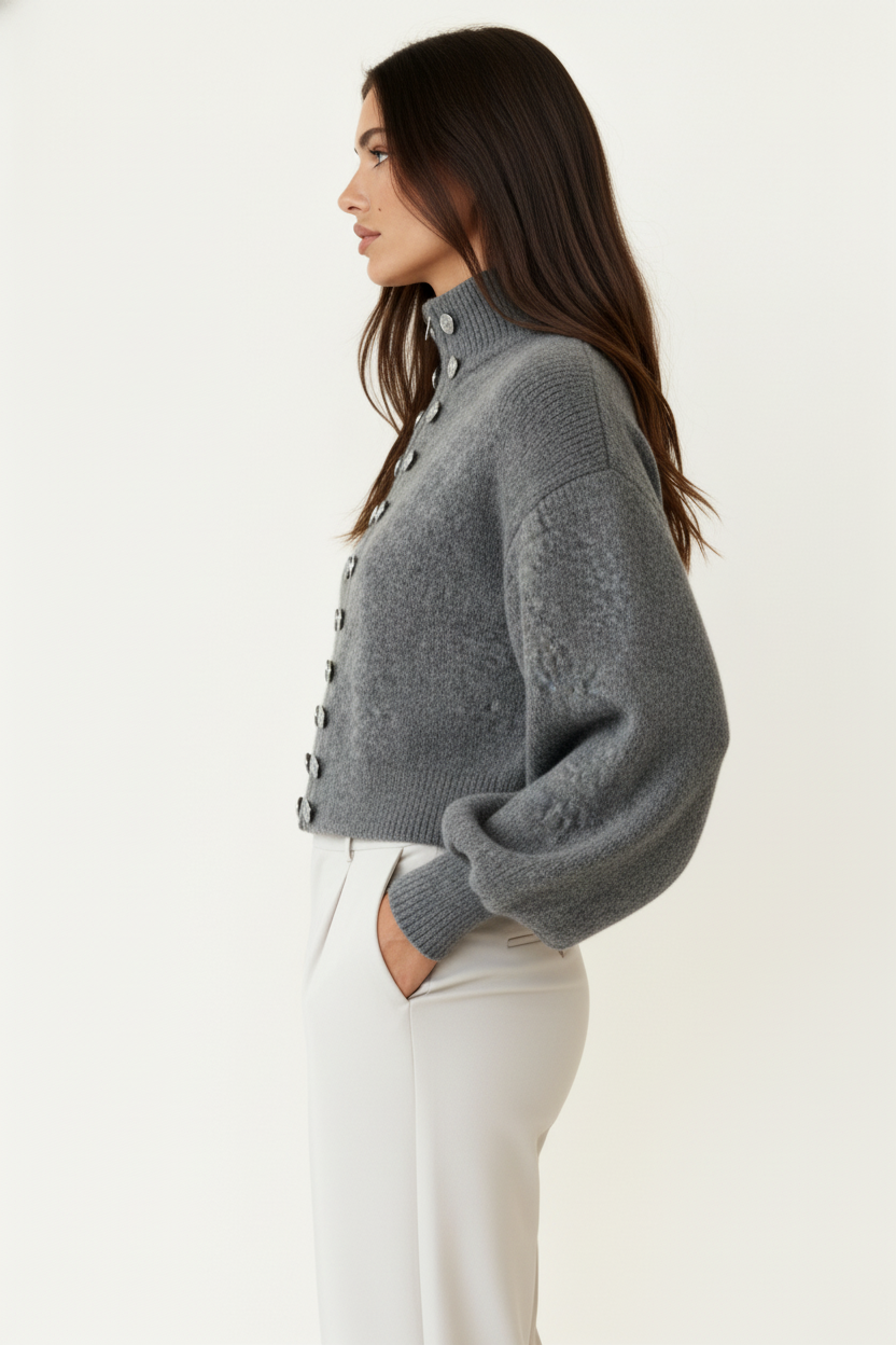 Grauer Pullover mit modernem Strickdesign