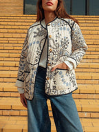 Steppjacke mit Blumenmuster und Ethno-Muster