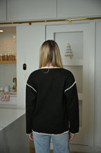 Schwarze Jacke mit floralem Muster