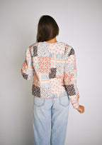 Schwarze Jacke mit Blumenprint